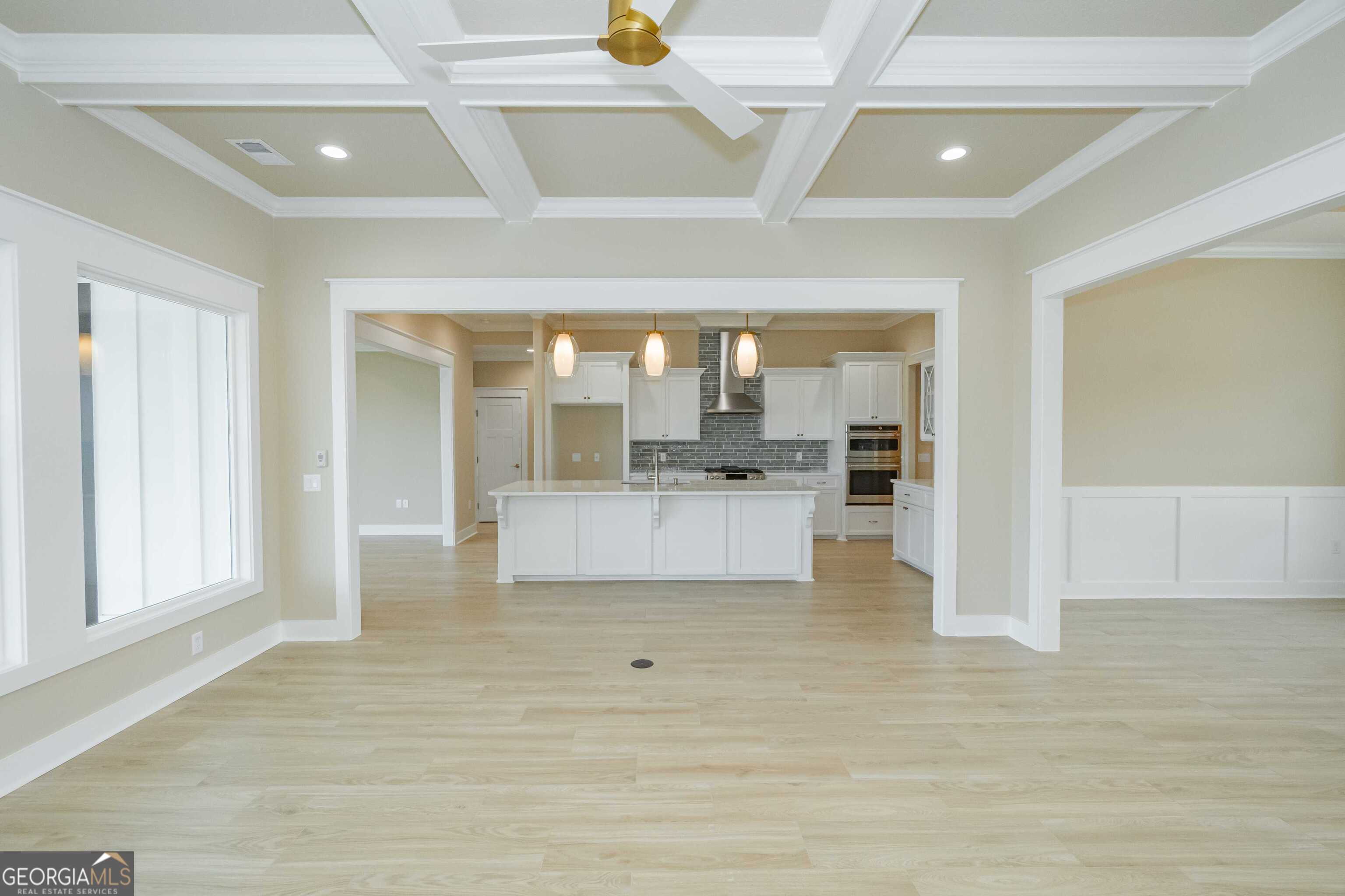 201 Riley Hunter Drive Kingsland, GA 31548 - Photo 20 of 79 a view of a living room kitchen with stainless steel appliances kitchen island granite countertop wooden floor