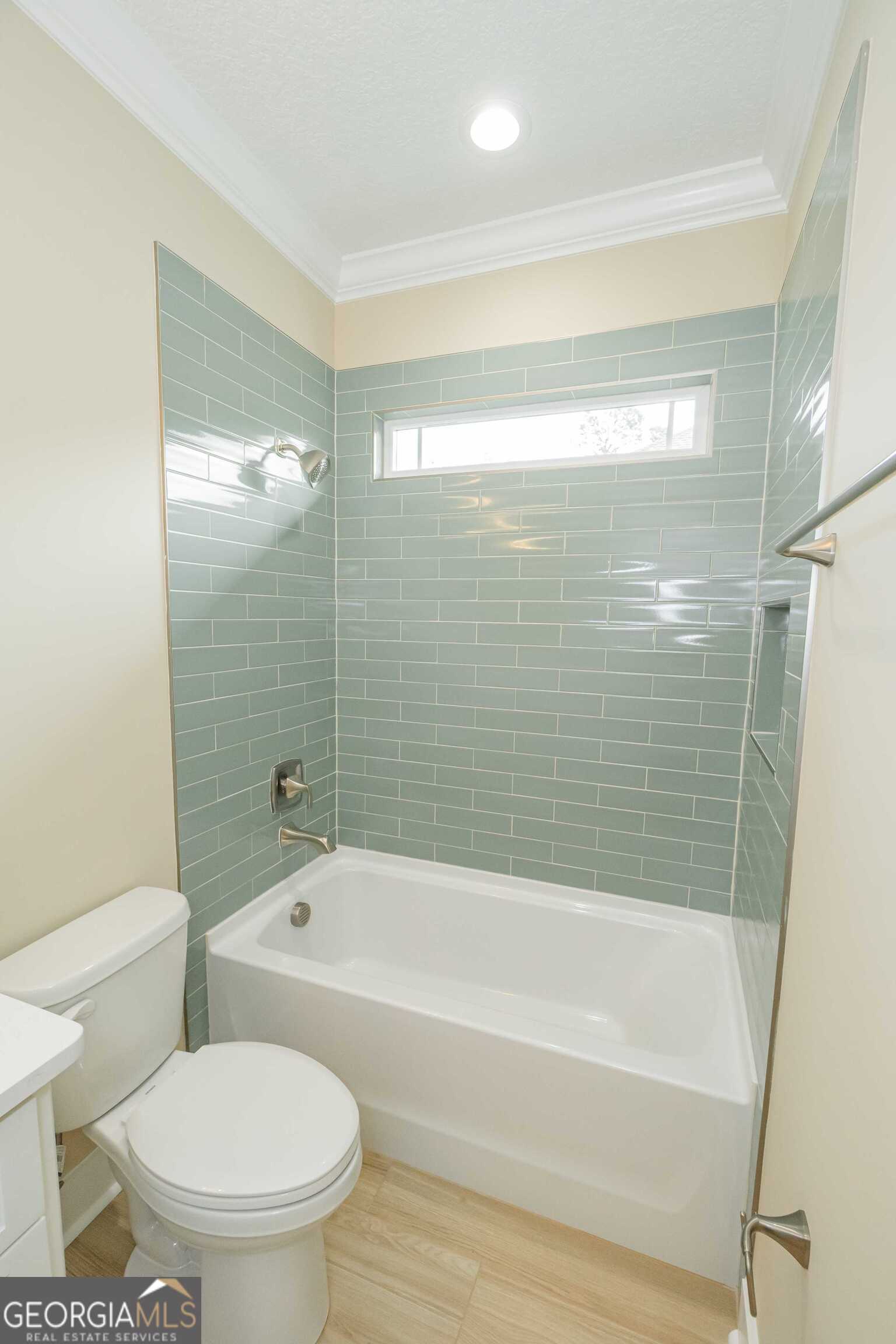 201 Riley Hunter Drive Kingsland, GA 31548 - Photo 59 of 79 a bathroom with toilet shower and bathtub