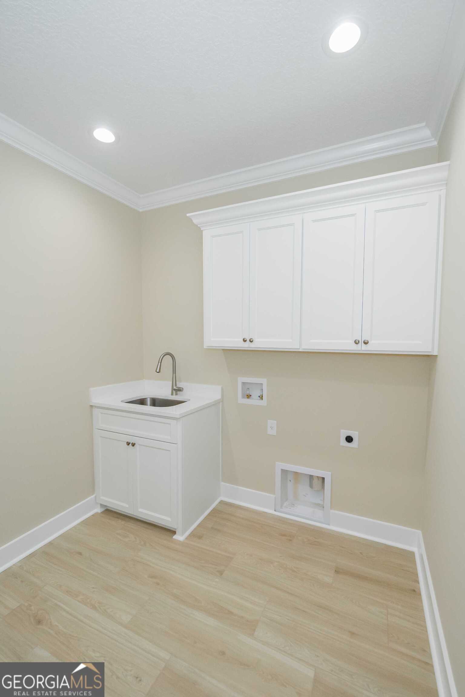 201 Riley Hunter Drive Kingsland, GA 31548 - Photo 71 of 79 a view of a kitchen with white cabinets