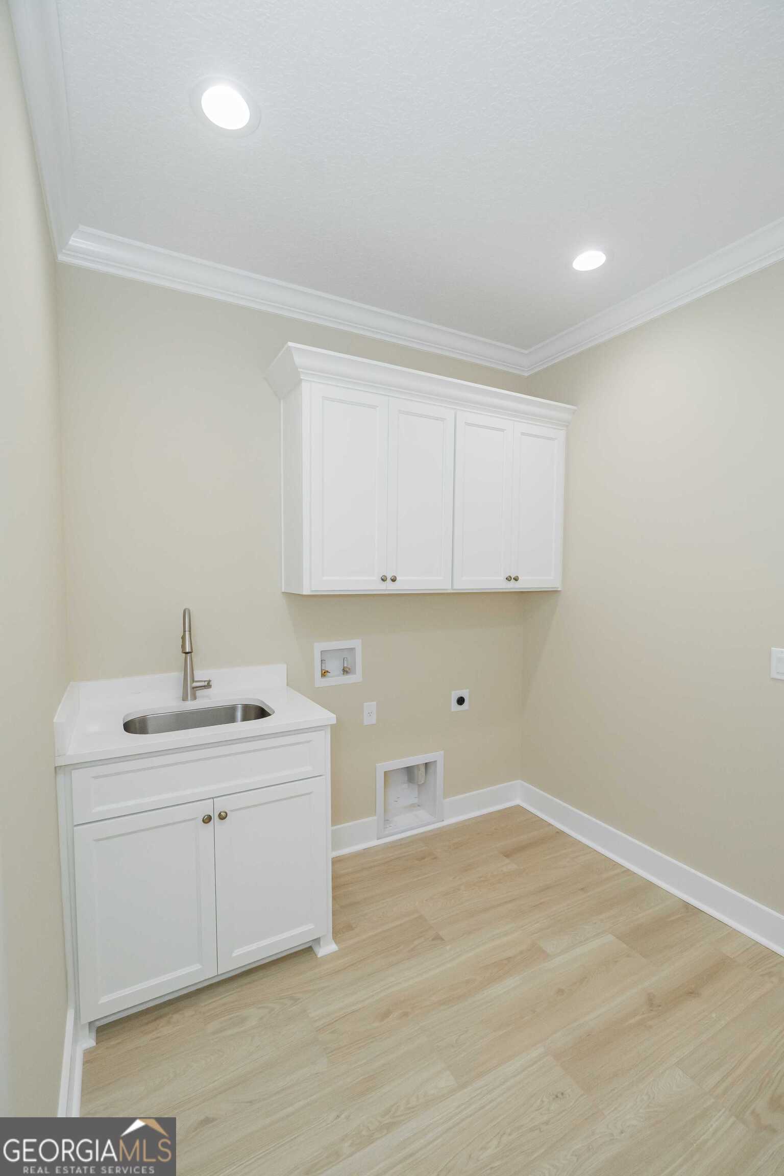 201 Riley Hunter Drive Kingsland, GA 31548 - Photo 73 of 79 a room with a sink cabinets and utility room
