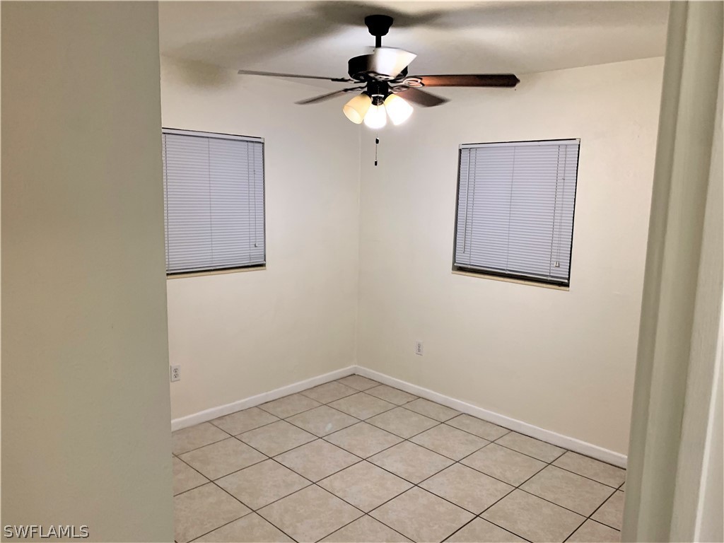 301 East Penn Road Lehigh Acres, FL 33936 - Photo 13 of 25 a view of an empty room