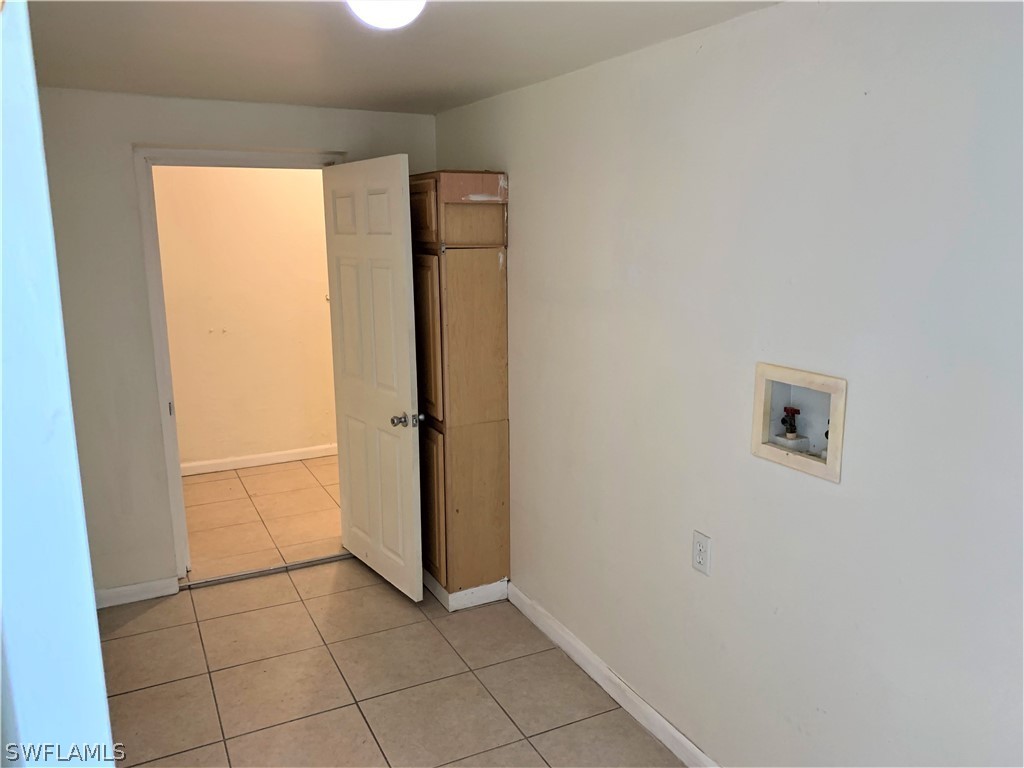 301 East Penn Road Lehigh Acres, FL 33936 - Photo 19 of 25 a view of an empty room and window