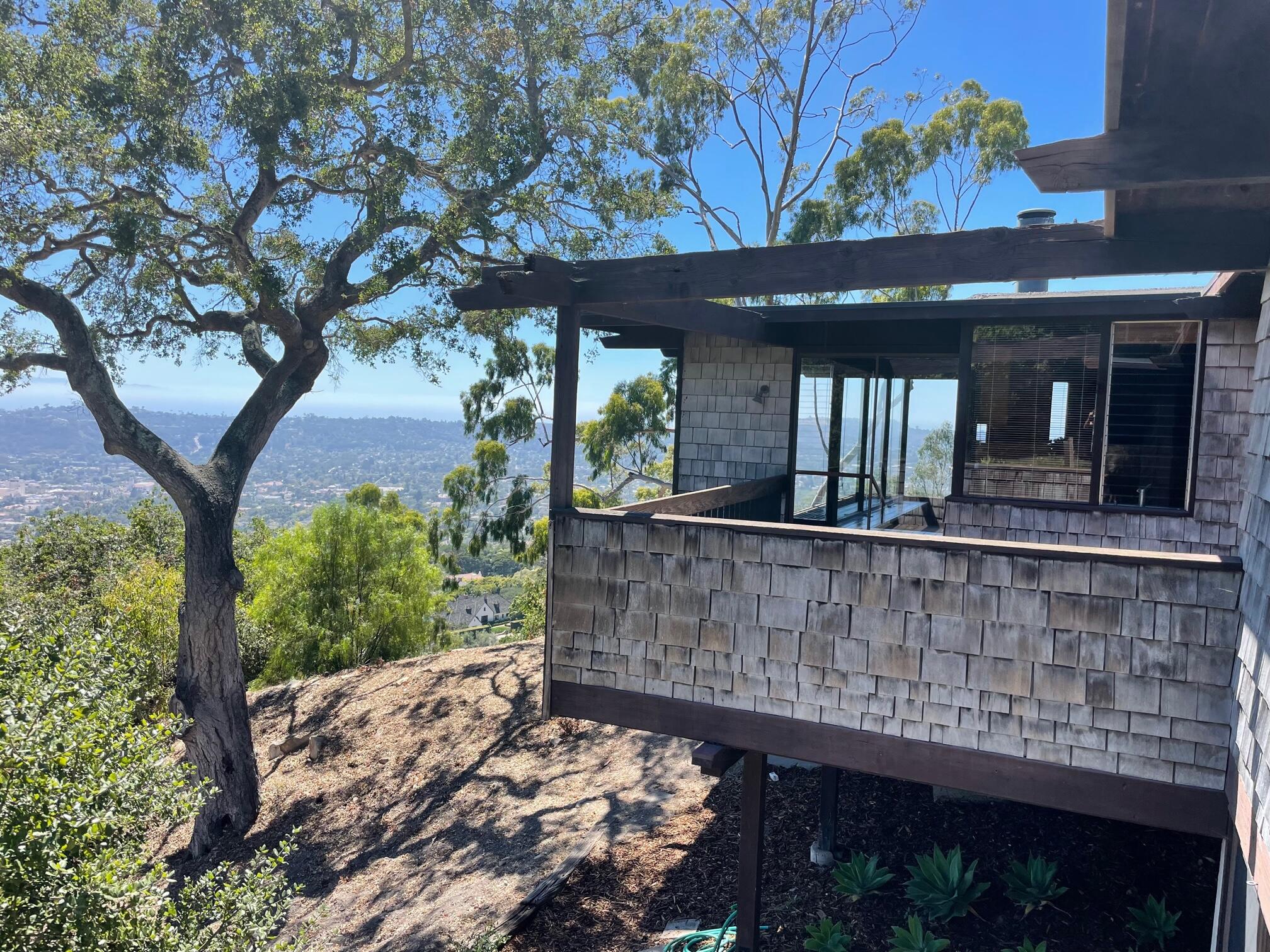 1777 Las Tunas Road Santa Barbara, CA 93103 - Photo 2 of 10 a front view of a house with a tree