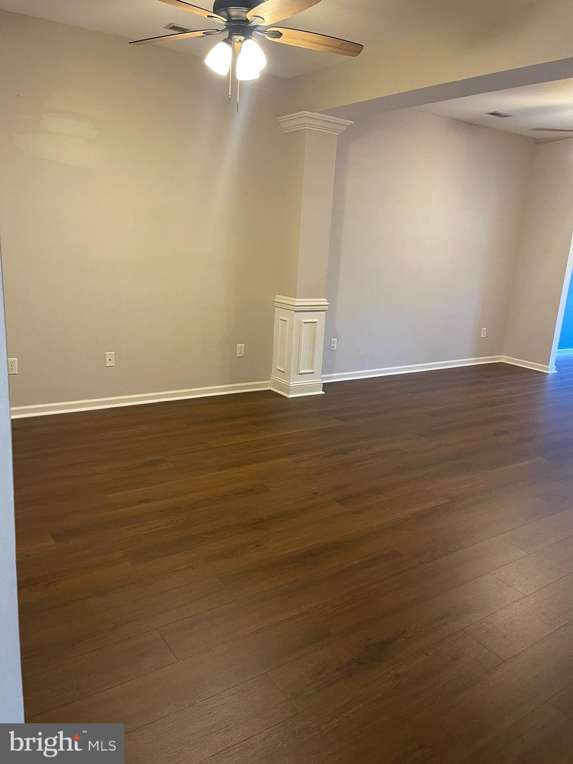 310 Norwalk Way Middletown, DE 19709 - Photo 3 of 37 a view of an empty room with wooden floor