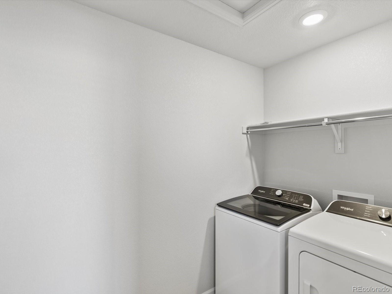 7305 West 27th St Road Greeley, CO 80634 - Photo 17 of 29 a utility room with dryer and washer