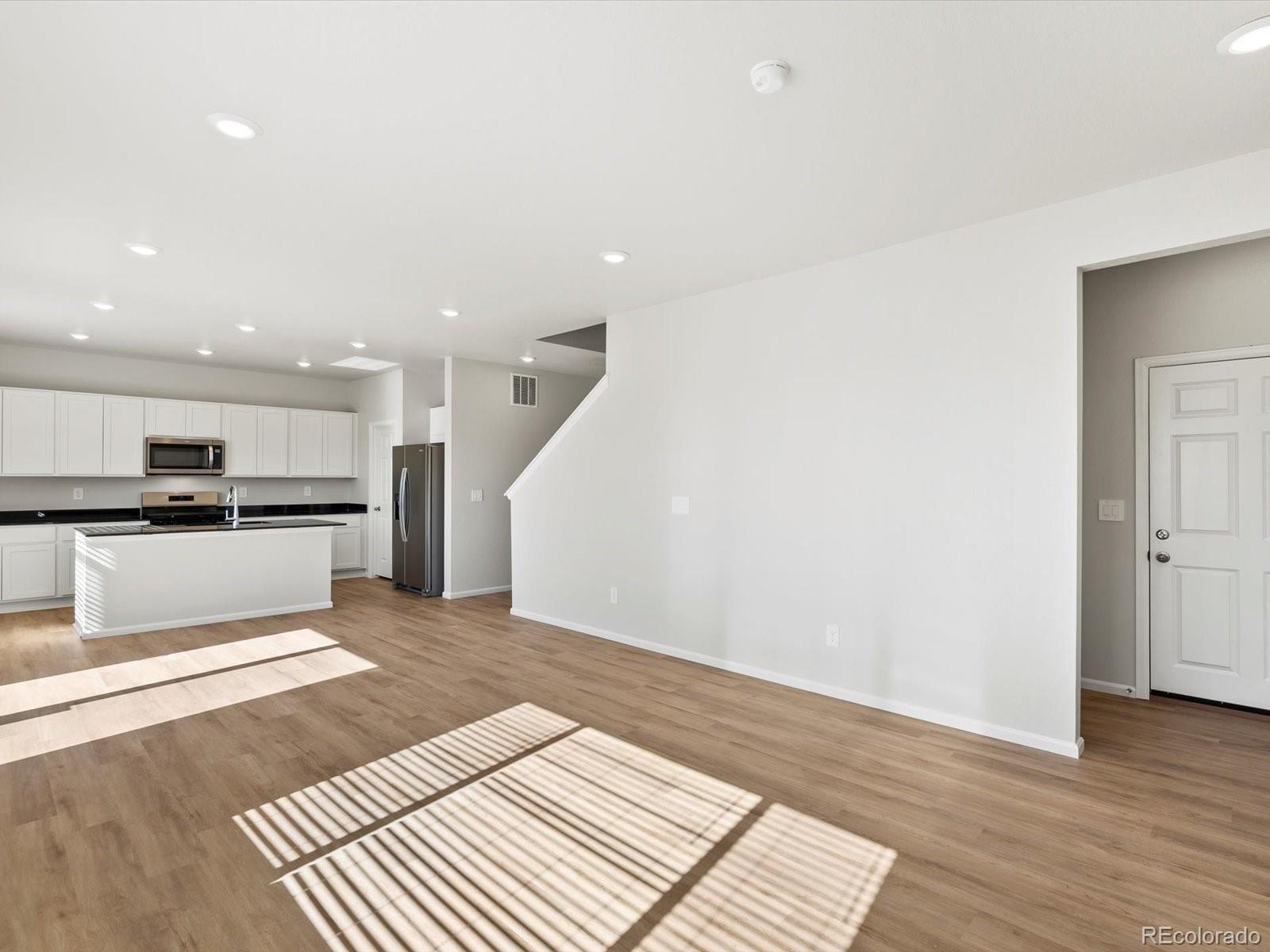 7305 West 27th St Road Greeley, CO 80634 - Photo 7 of 29 a view of kitchen with sink and refrigerator
