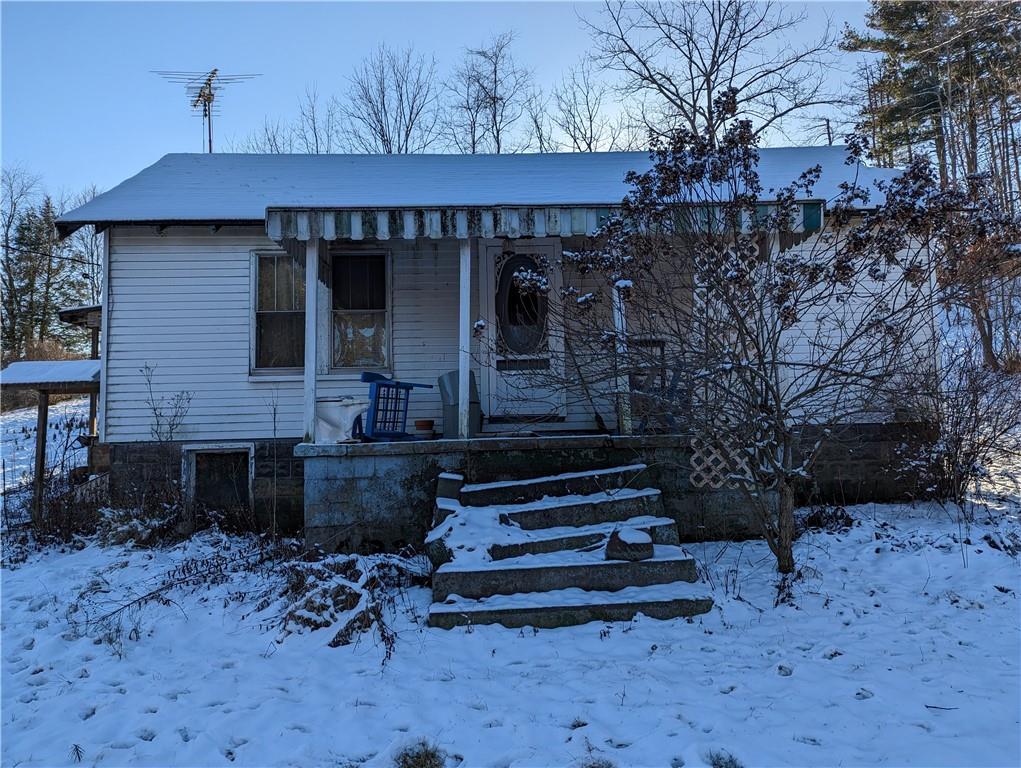 912 Barr Run Road Marianna, PA 15345 - Photo 1 of 1 a front view of a house with garden