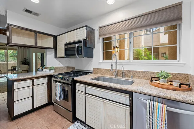 a view of a kitchen with a window