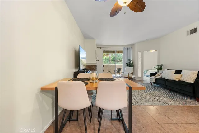 a bedroom with furniture and a table