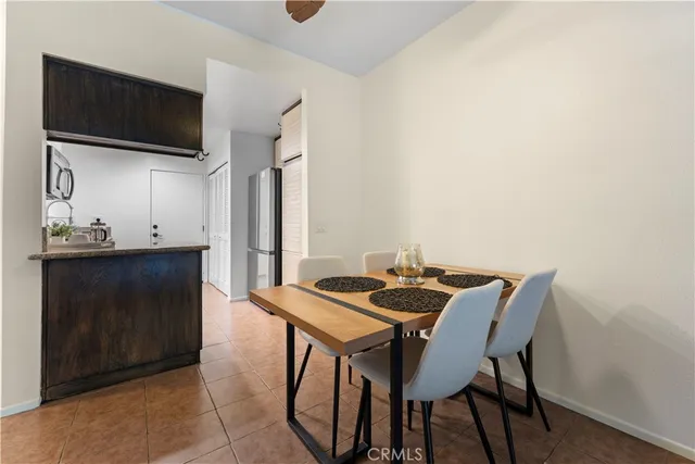 a view of a backyard with large trees