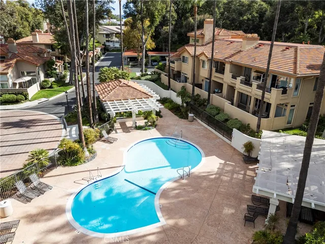 a view of a building with potted plants