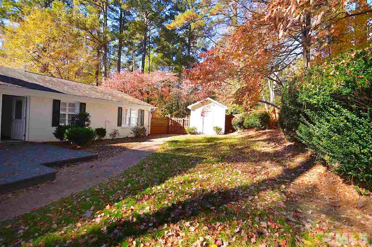 5800 Contour Drive Raleigh, NC 27612 - Photo 5 of 19 a view of house with backyard