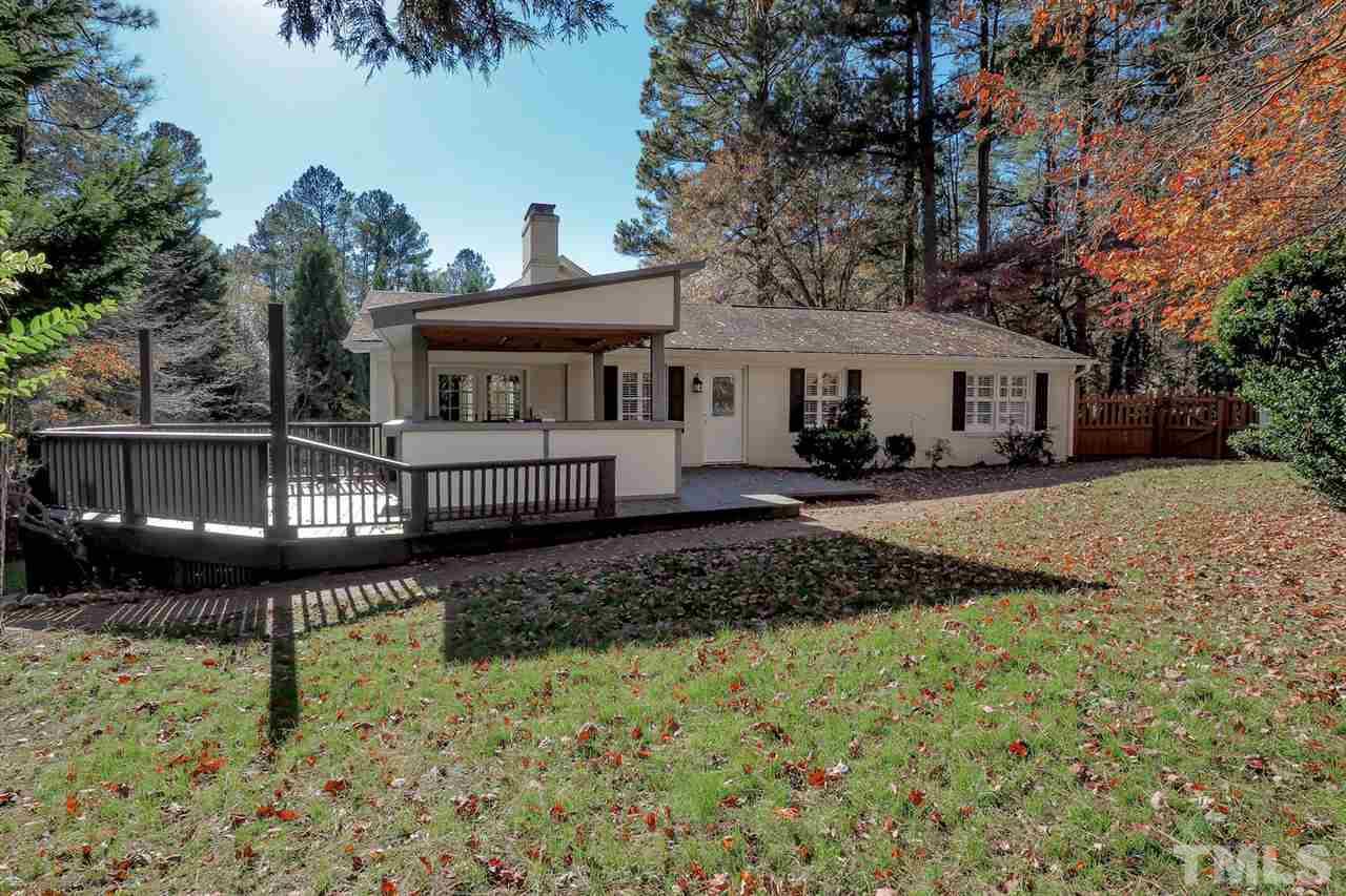 5800 Contour Drive Raleigh, NC 27612 - Photo 6 of 19 a front view of a house with garden
