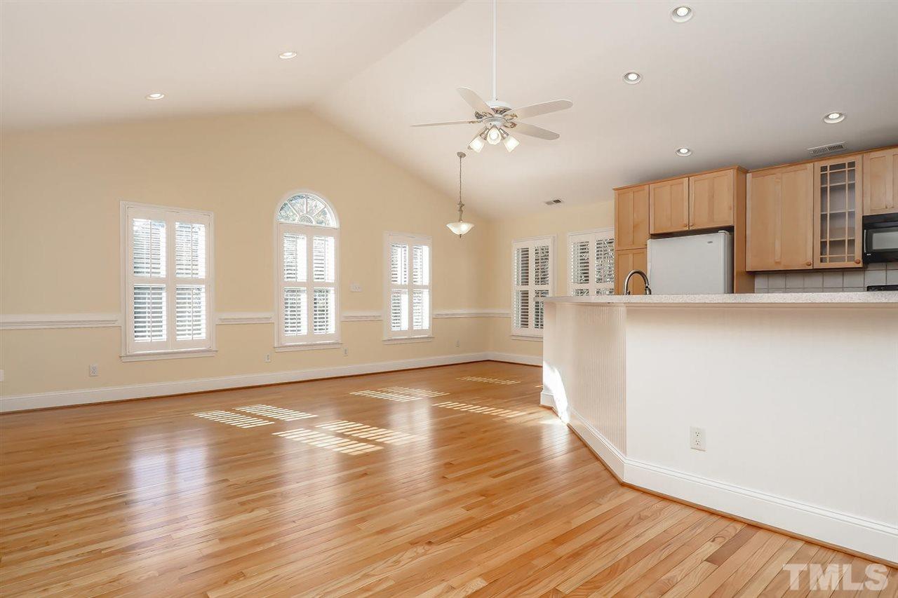 5800 Contour Drive Raleigh, NC 27612 - Photo 10 of 19 a view of a kitchen with wooden floor and a kitchen