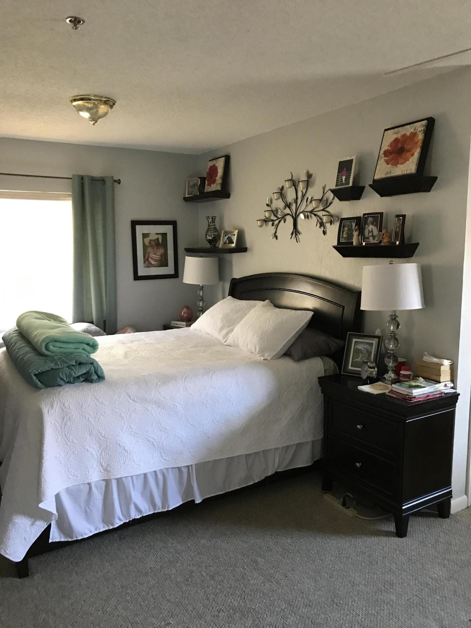 164 Riviera Circle Weston, FL 33326 - Photo 5 of 26 a bedroom with a bed and dresser