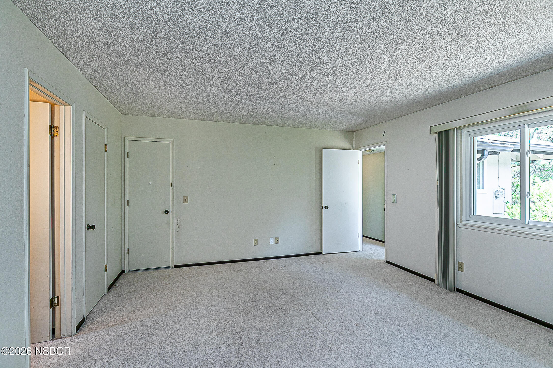 1260 Onstott Road Lompoc, CA 93436 - Photo 30 of 52 an empty room with windows and closet