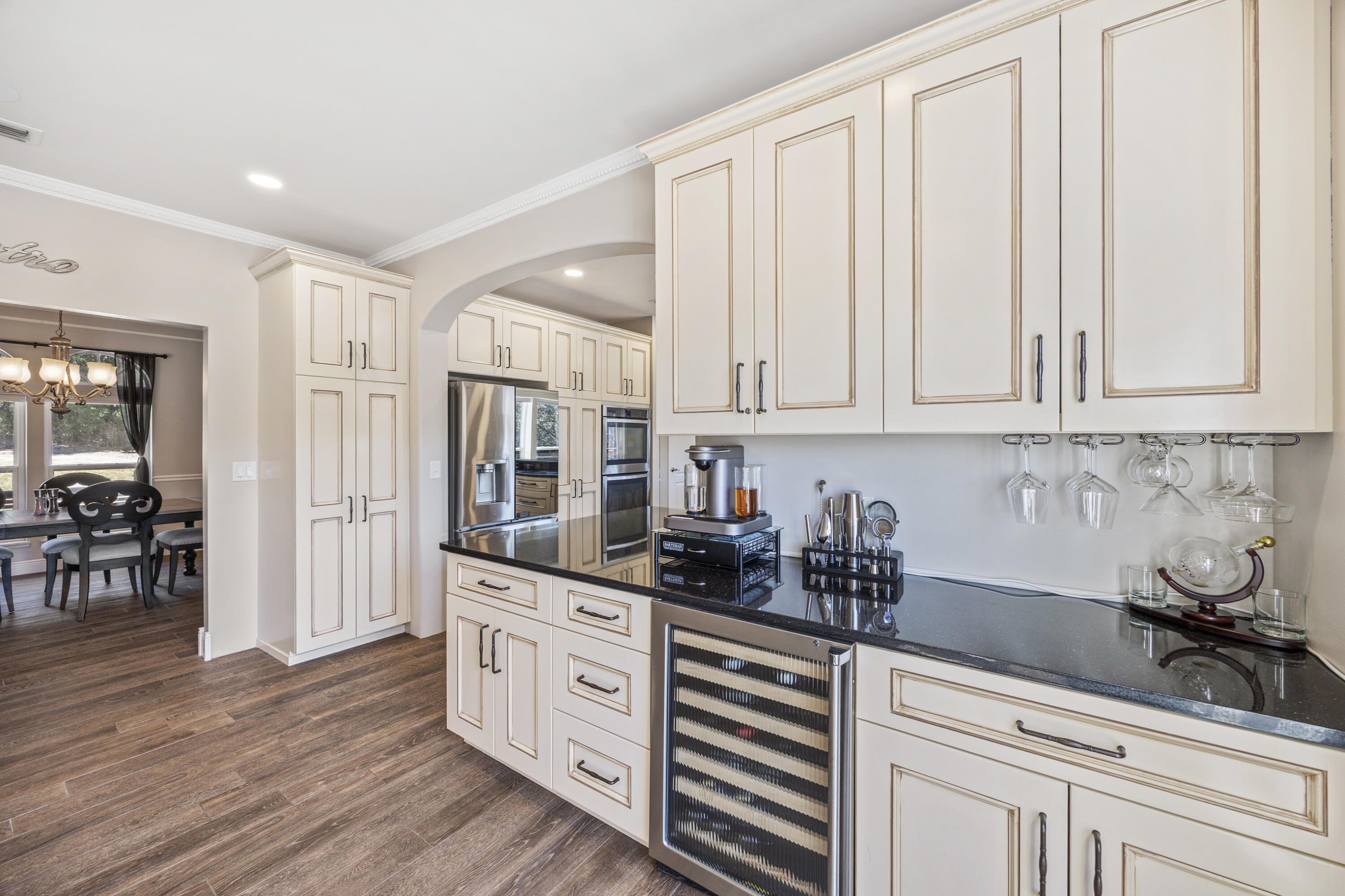 147 Eldredge Road Fort Walton Beach, FL 32547 - Photo 11 of 82 a kitchen with stainless steel appliances granite countertop a refrigerator sink and cabinets