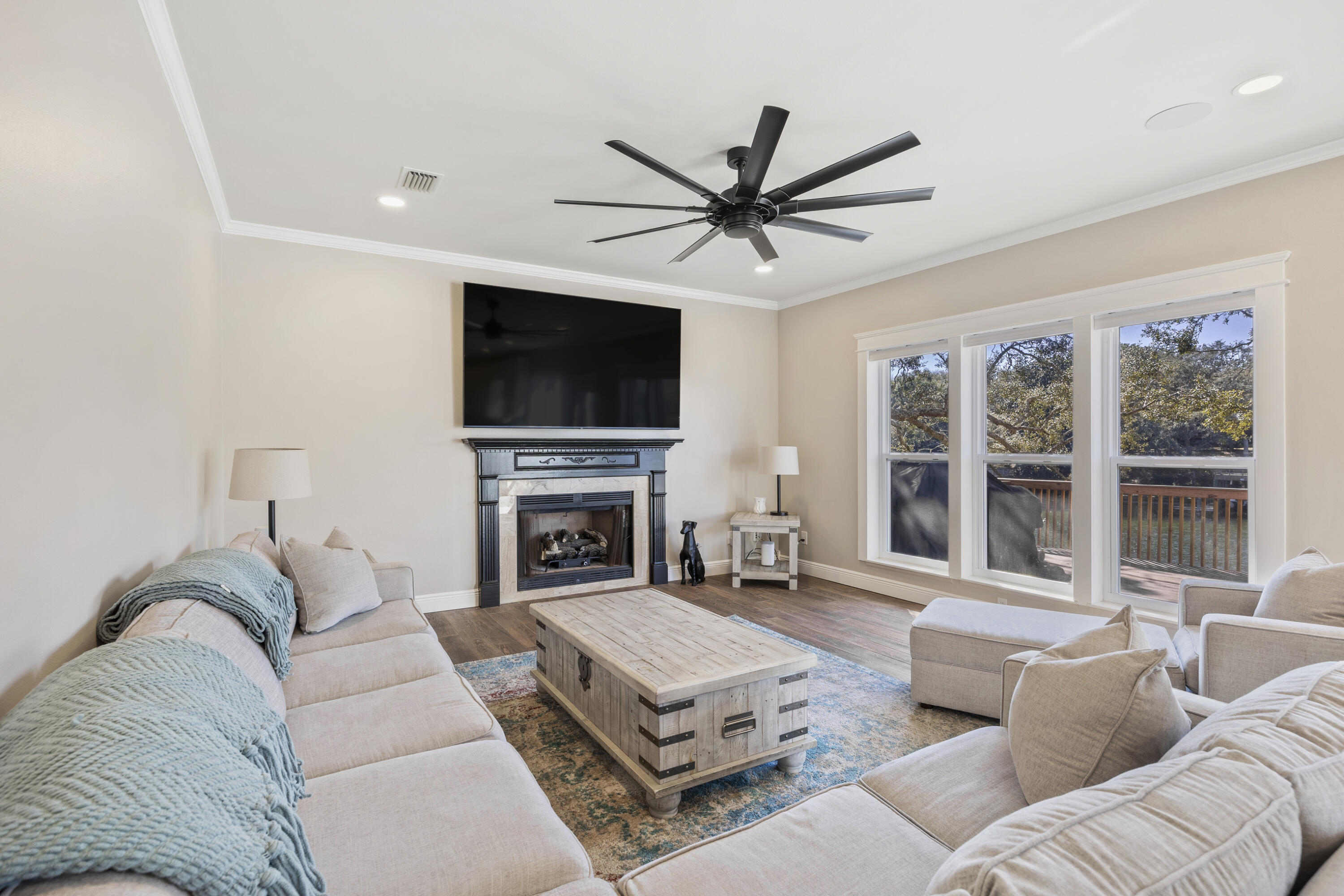 147 Eldredge Road Fort Walton Beach, FL 32547 - Photo 15 of 82 a living room with furniture a fireplace and a flat screen tv