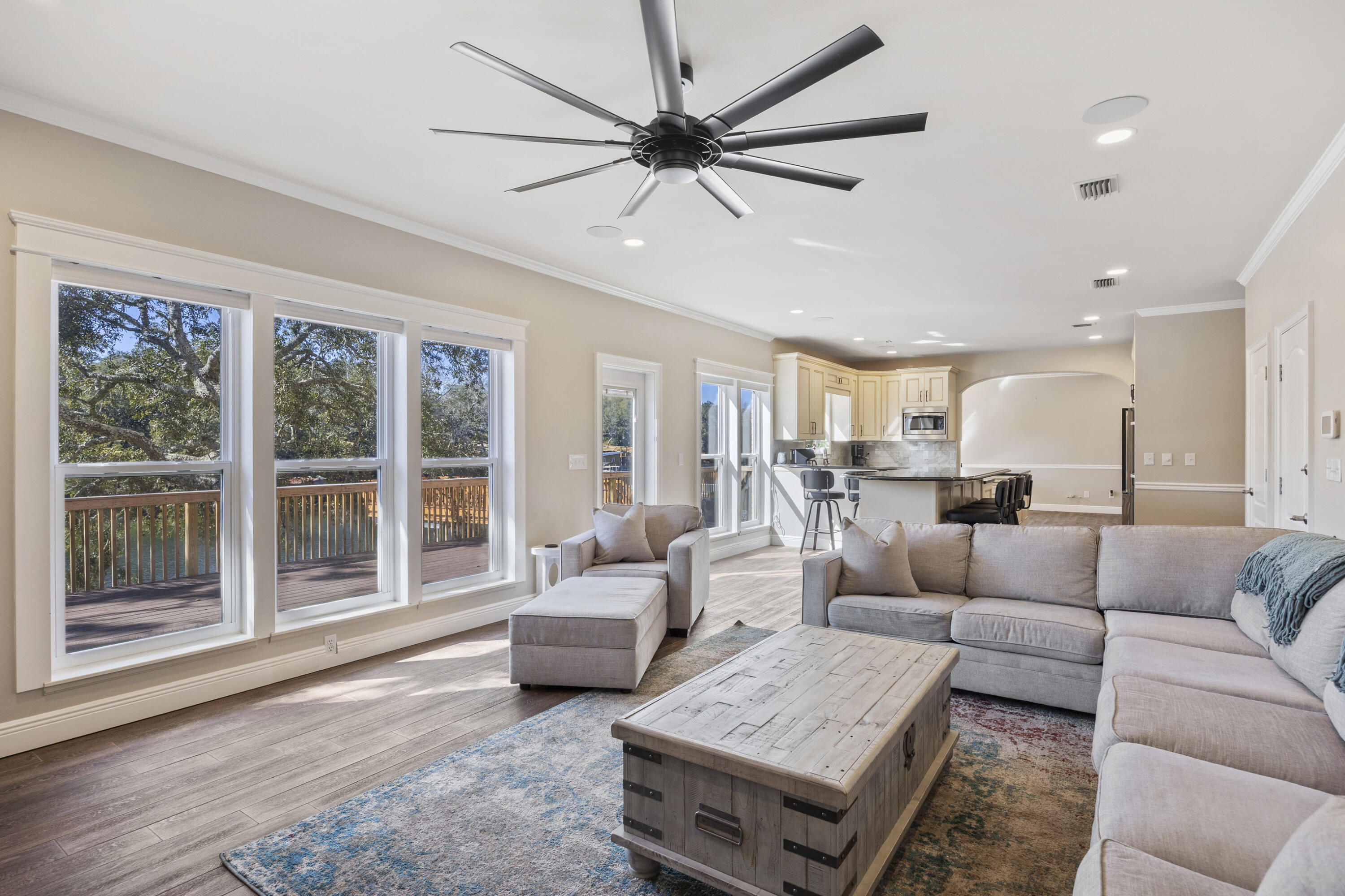 147 Eldredge Road Fort Walton Beach, FL 32547 - Photo 16 of 82 a living room with furniture and a large window