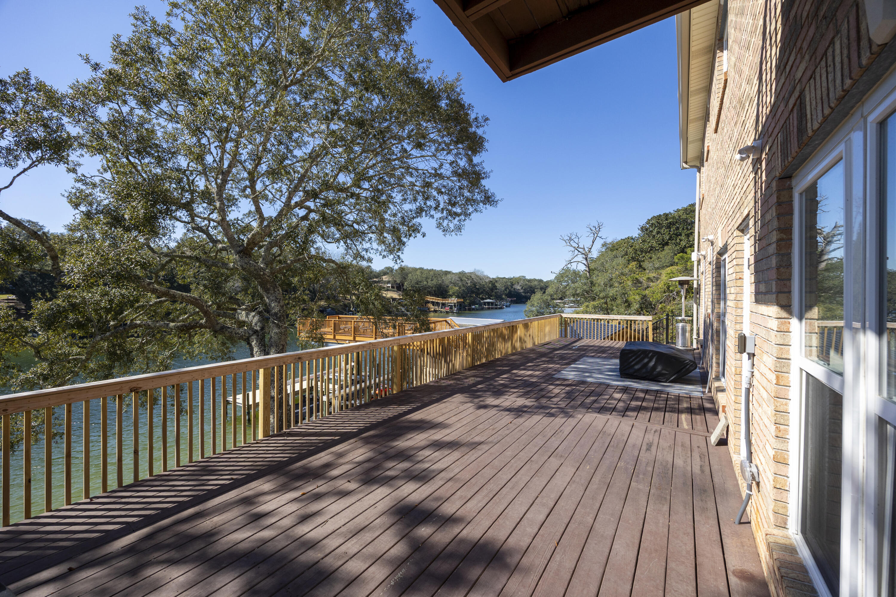 147 Eldredge Road Fort Walton Beach, FL 32547 - Photo 19 of 82 a view of a balcony with wooden floor