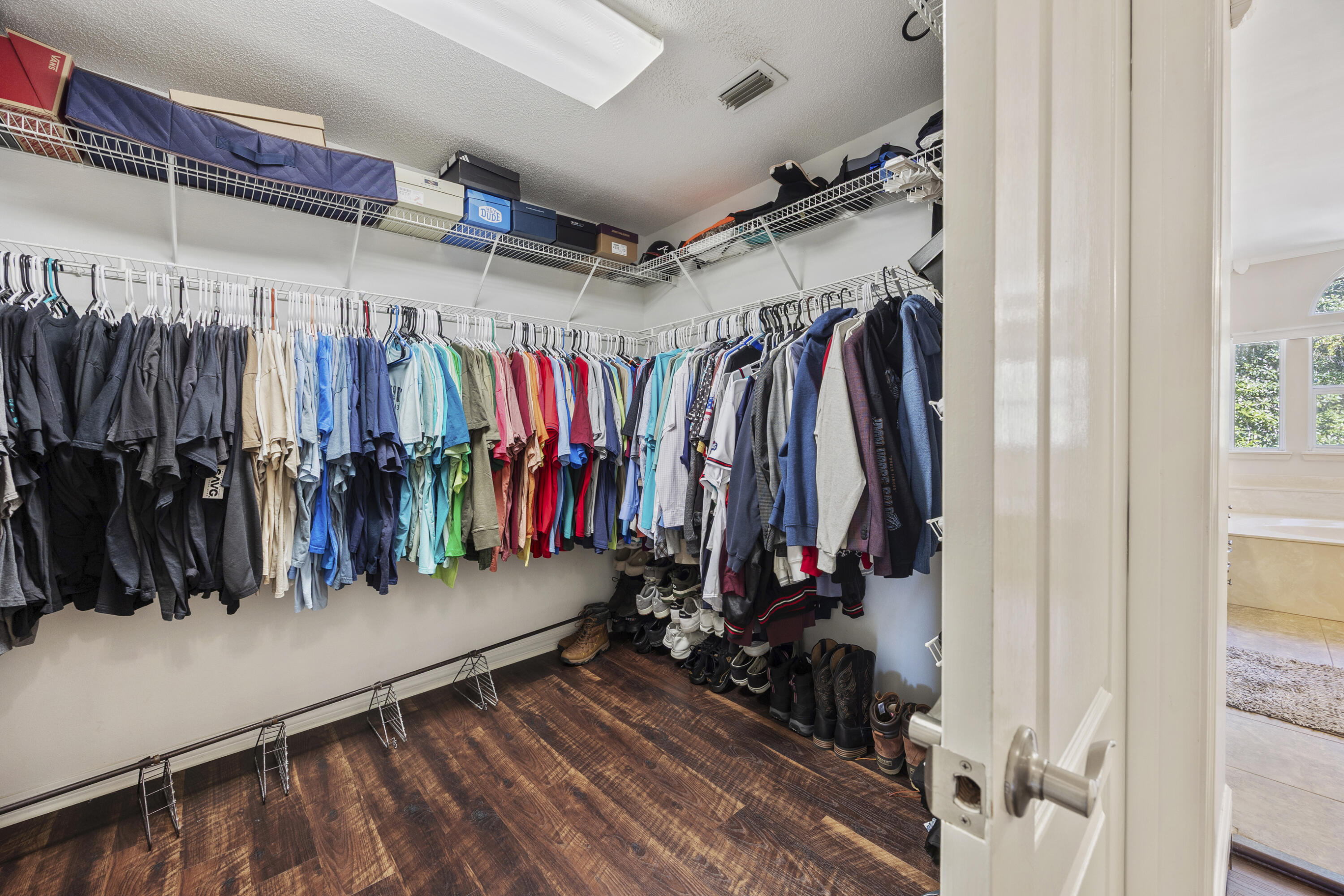147 Eldredge Road Fort Walton Beach, FL 32547 - Photo 31 of 82 a view of walk in closet with clothes