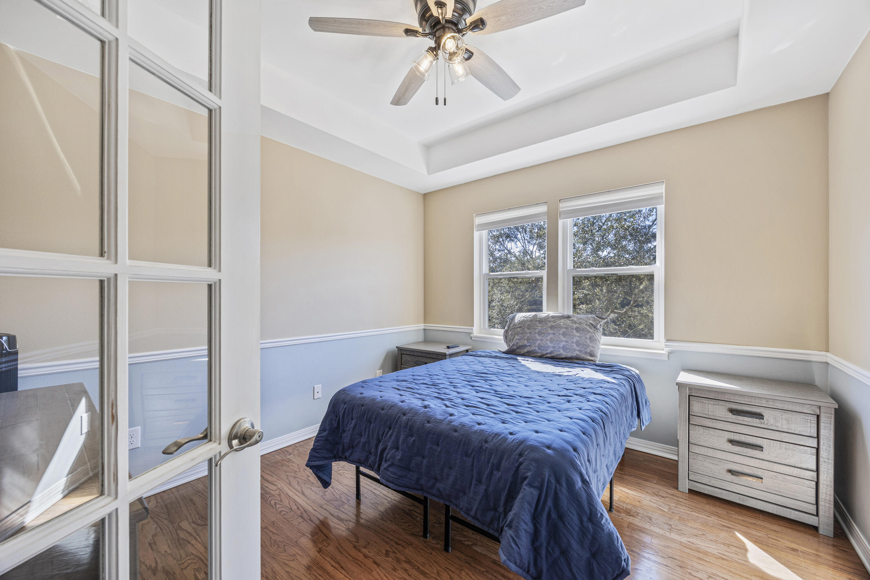 147 Eldredge Road Fort Walton Beach, FL 32547 - Photo 33 of 82 a bed sitting in a bedroom next to a window