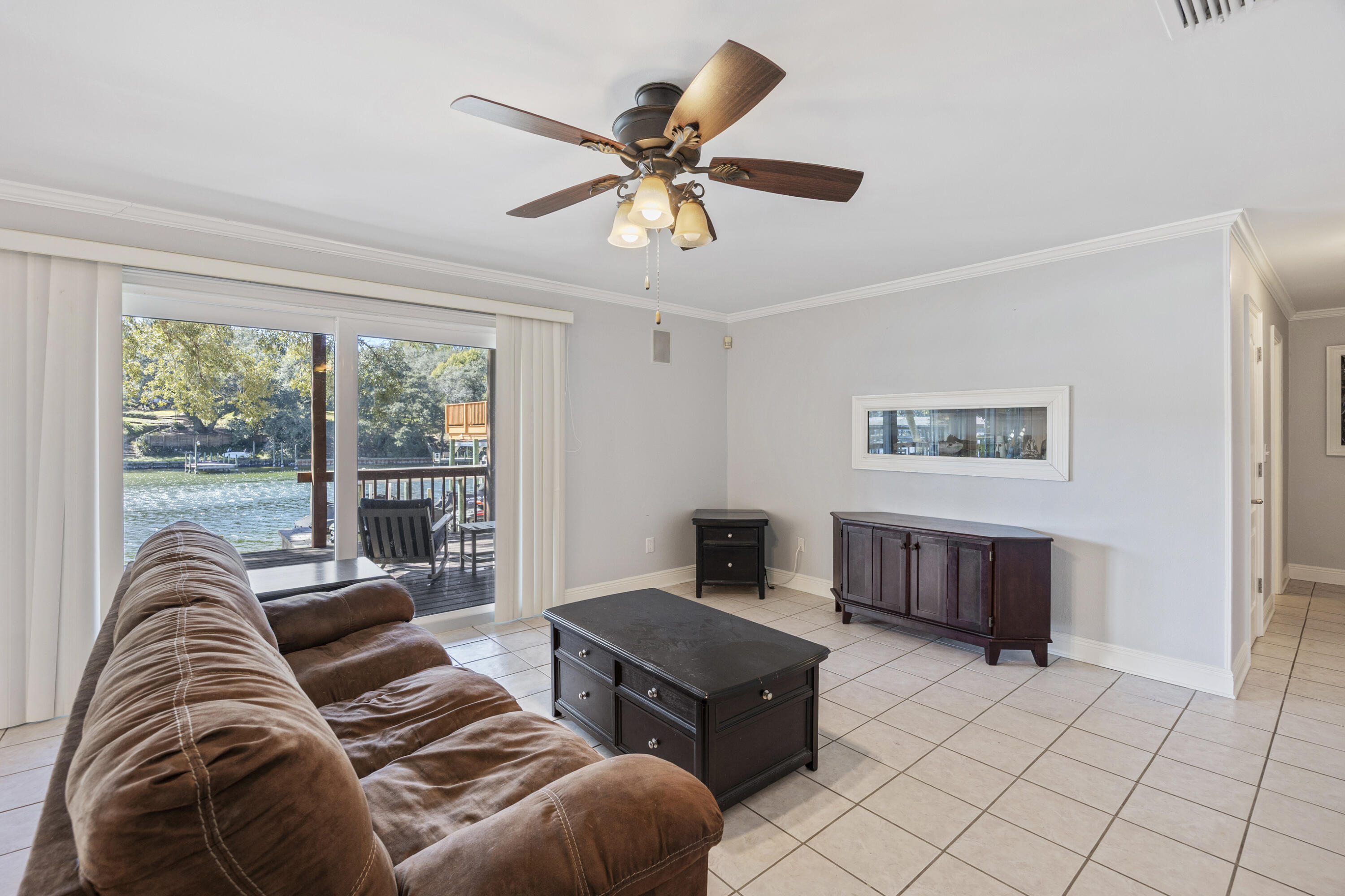 147 Eldredge Road Fort Walton Beach, FL 32547 - Photo 49 of 82 a living room with furniture and a large window
