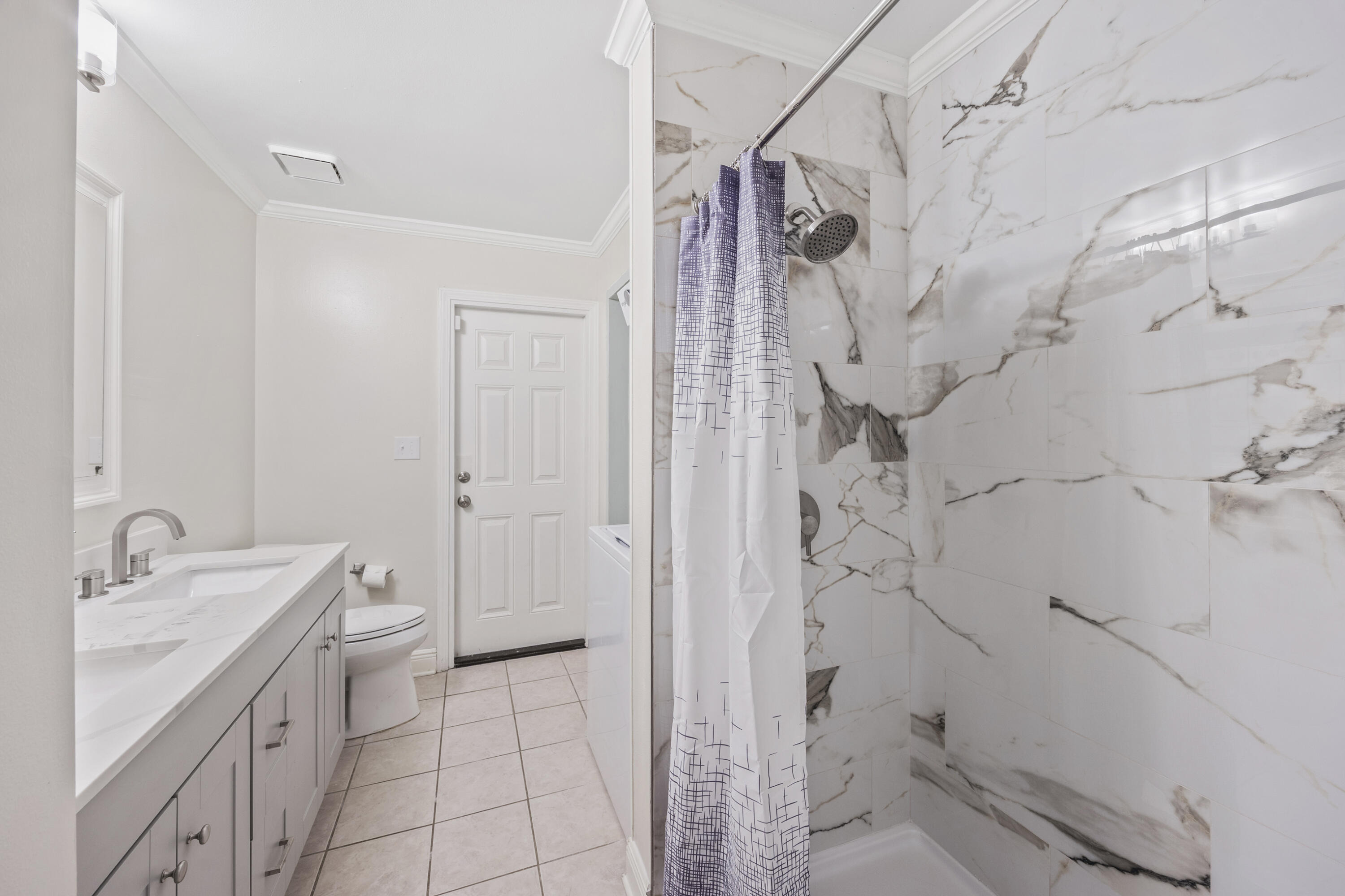 147 Eldredge Road Fort Walton Beach, FL 32547 - Photo 50 of 82 a bathroom with a granite countertop shower sink vanity and mirror