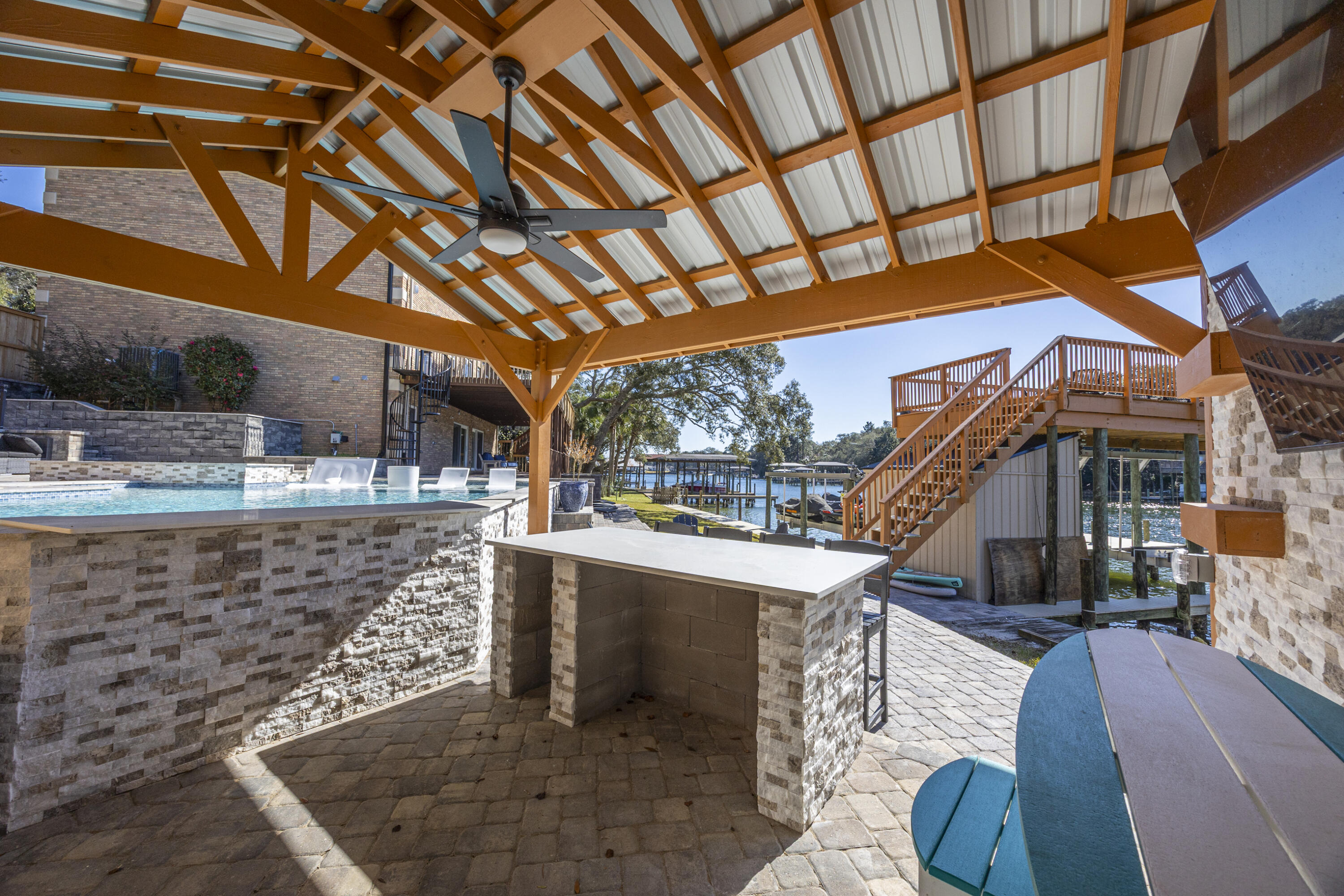 147 Eldredge Road Fort Walton Beach, FL 32547 - Photo 65 of 82 a view of a porch with furniture and a yard