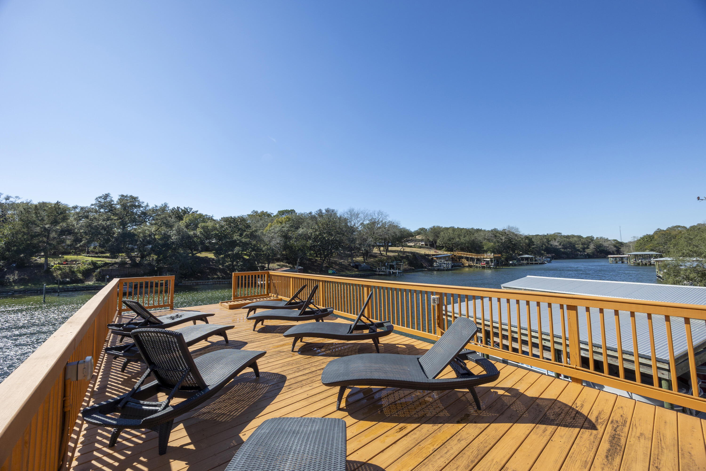 147 Eldredge Road Fort Walton Beach, FL 32547 - Photo 70 of 82 a view of a roof deck with couches and sky view