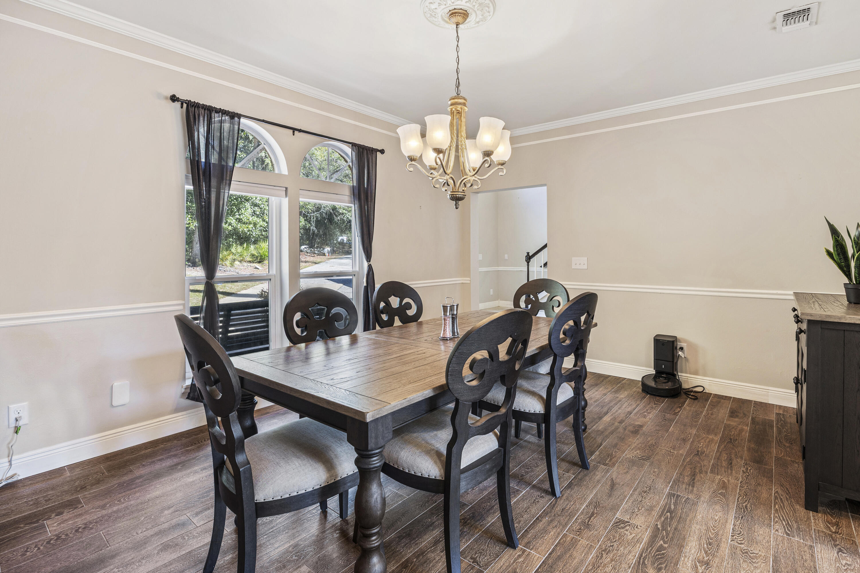 147 Eldredge Road Fort Walton Beach, FL 32547 - Photo 7 of 82 a view of a dining room with furniture window and wooden floor