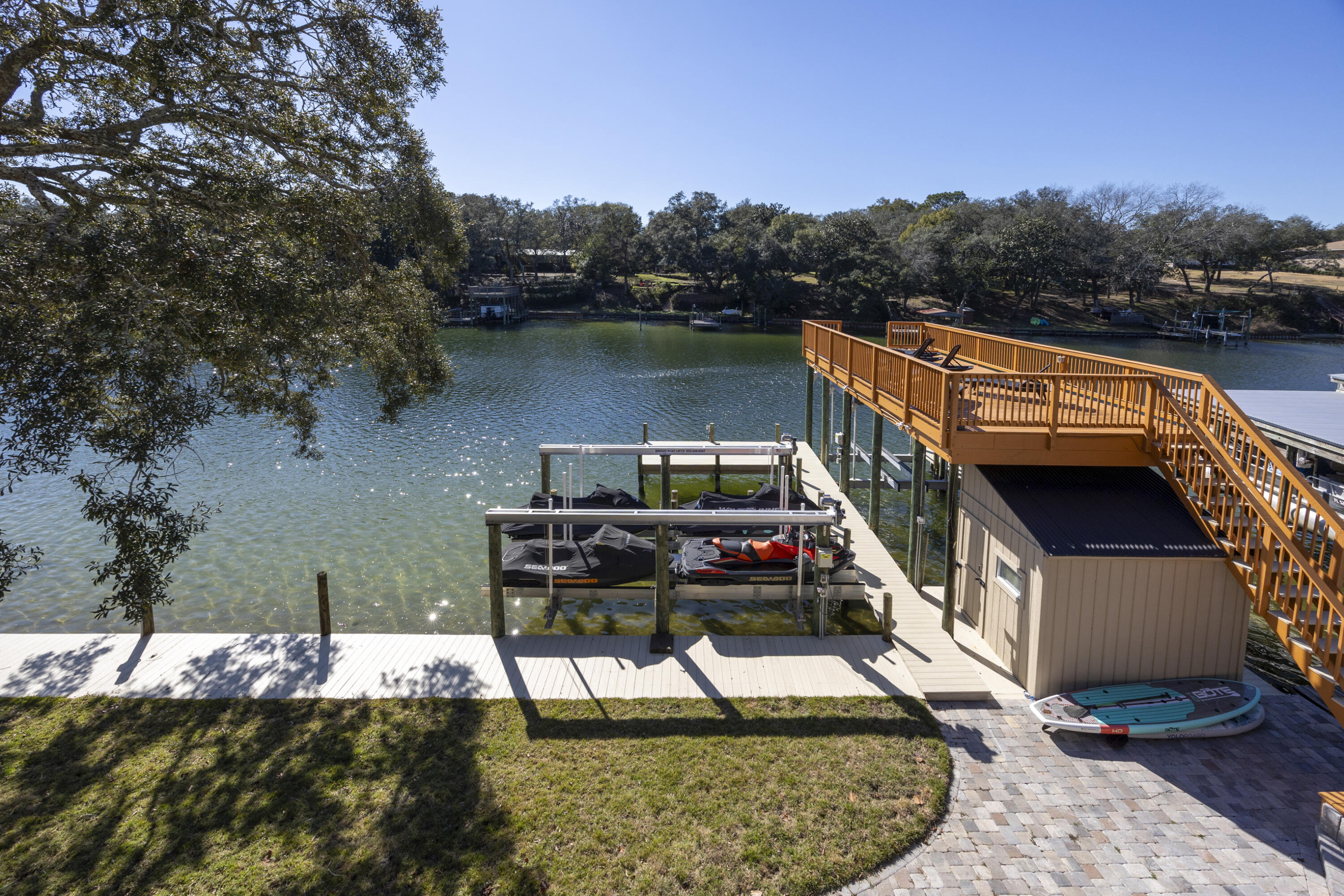 147 Eldredge Road Fort Walton Beach, FL 32547 - Photo 79 of 82 a balcony with furniture and a lake view