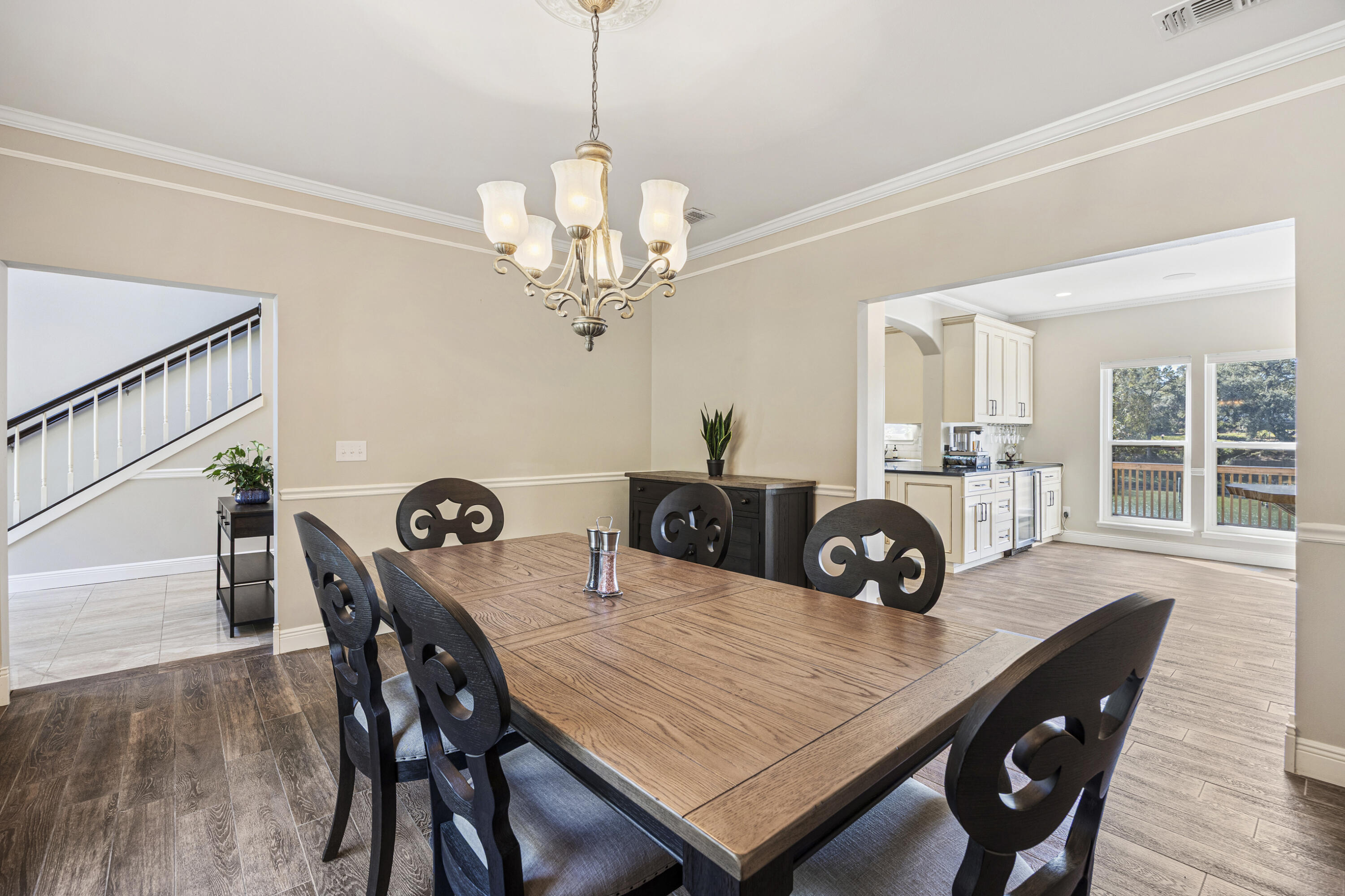147 Eldredge Road Fort Walton Beach, FL 32547 - Photo 8 of 82 a view of a dining room with furniture window and wooden floor