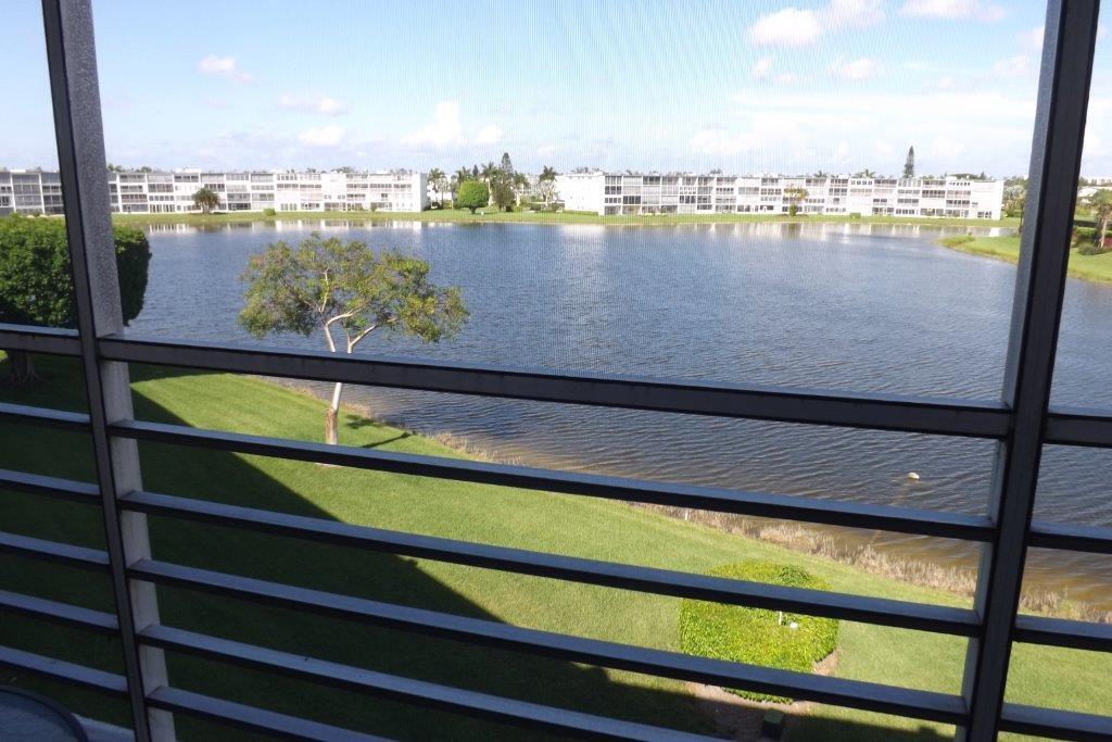 4014 Cornwall East, Unit 4014 Boca Raton, FL 33434 - Photo 23 of 67 a view of a lake from a balcony