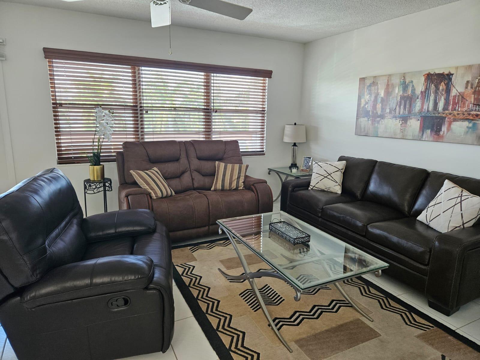 4014 Cornwall East, Unit 4014 Boca Raton, FL 33434 - Photo 3 of 67 a living room with furniture and a window