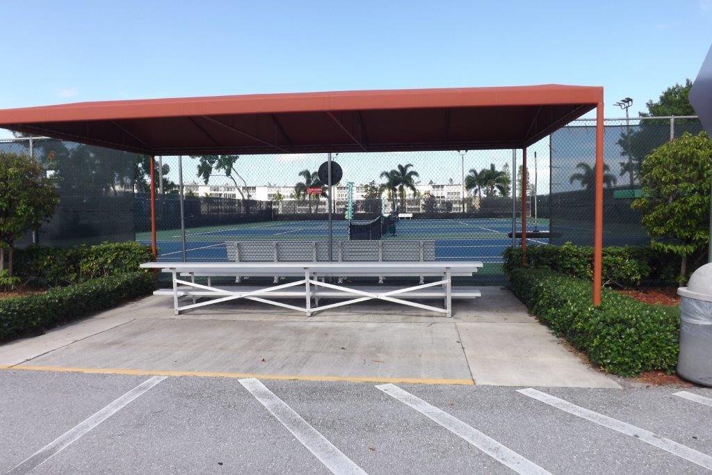 4014 Cornwall East, Unit 4014 Boca Raton, FL 33434 - Photo 55 of 67 a view of a outdoor sitting area with furniture and umbrella