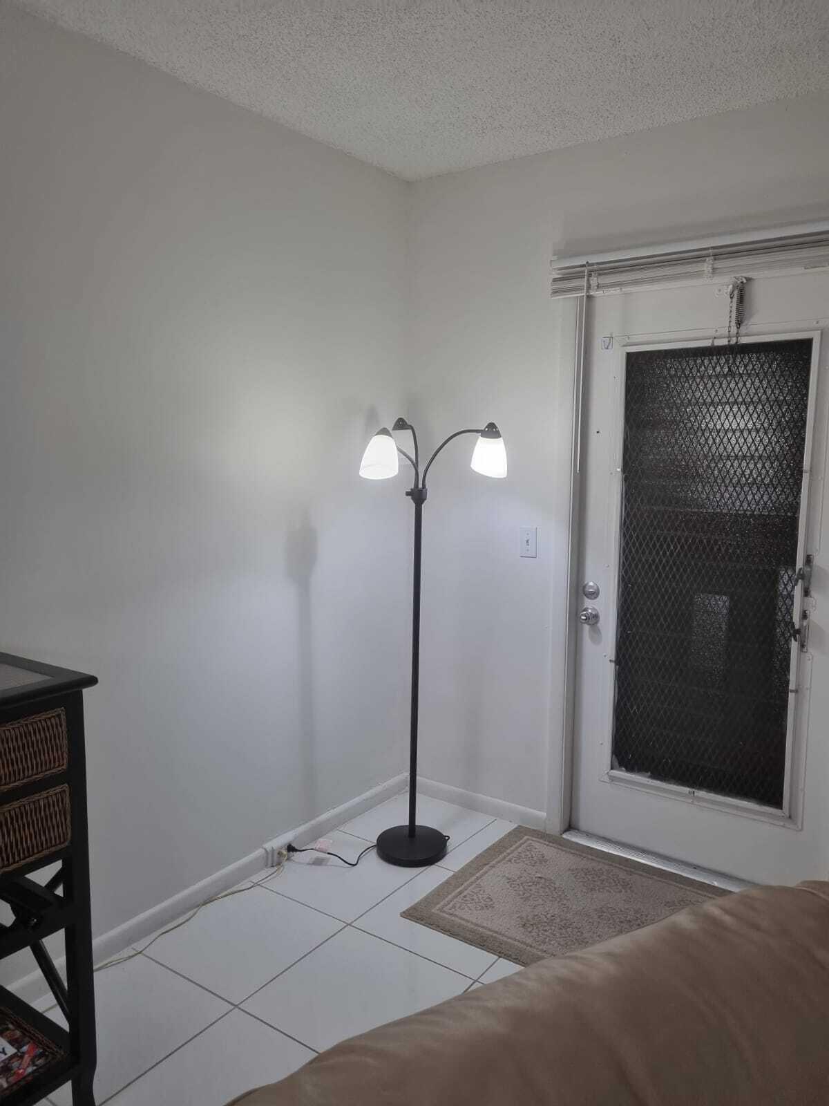 4014 Cornwall East, Unit 4014 Boca Raton, FL 33434 - Photo 6 of 67 a view of a livingroom with a staircase