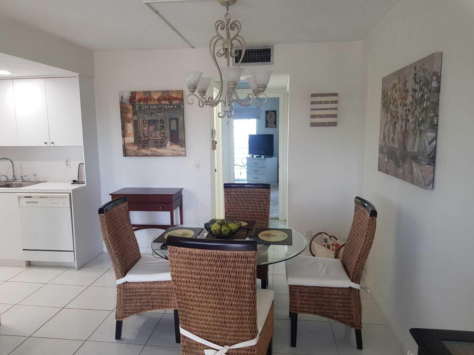 4014 Cornwall East, Unit 4014 Boca Raton, FL 33434 - Photo 9 of 67 a dining room with furniture and window