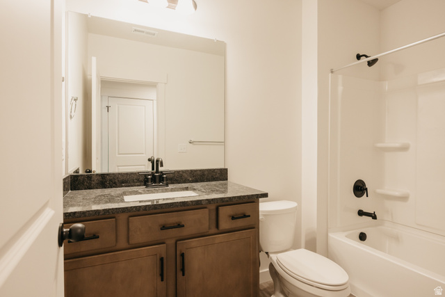 4595 North Fallow Way, Unit 511 Eagle Mountain, UT 84005 - Photo 30 of 32 Full bathroom with vanity and shower combination