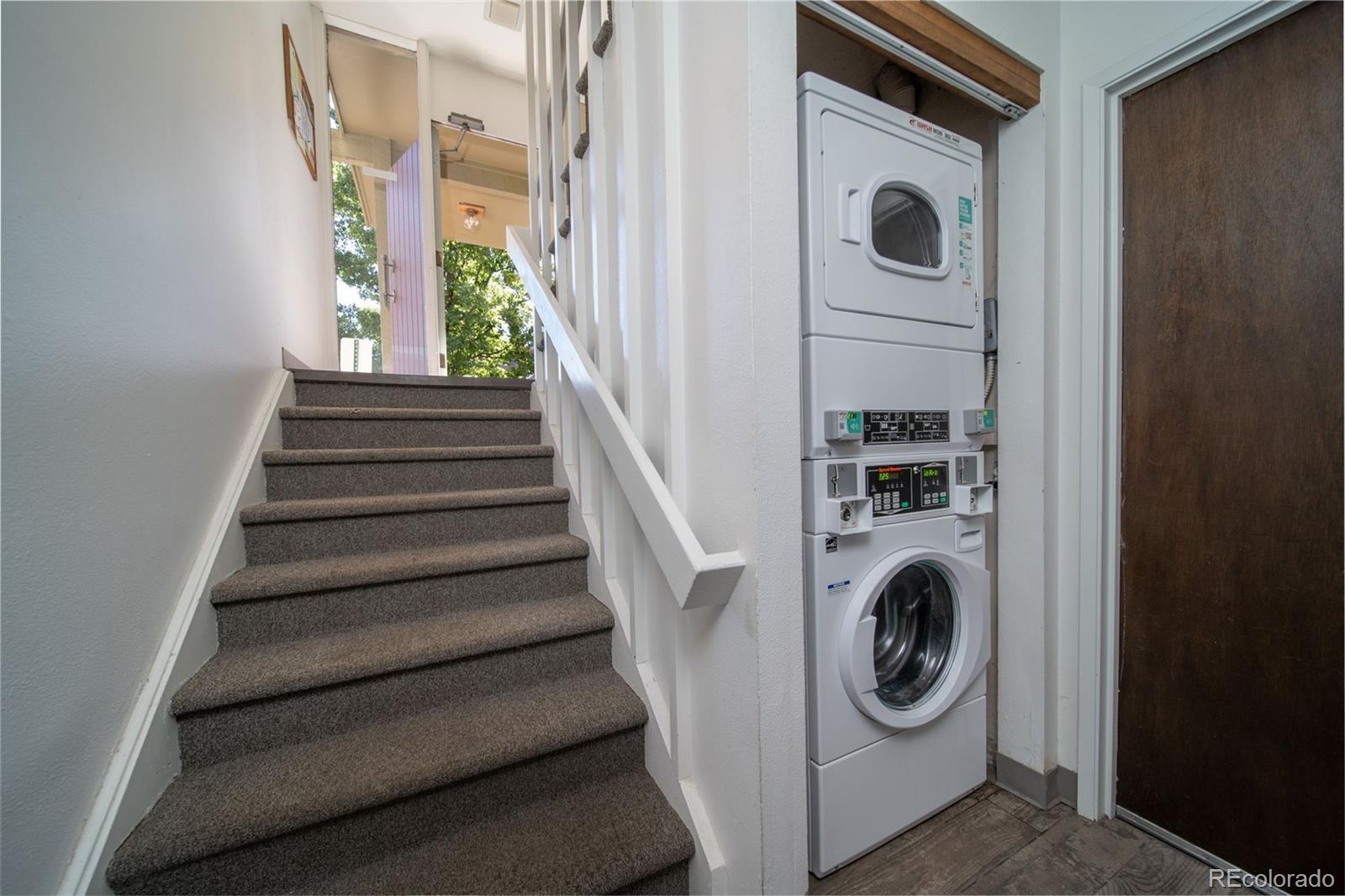 3375 Chisholm Trail, Unit A102 Boulder, CO 80301 - Photo 23 of 40 a utility room with dryer and washer