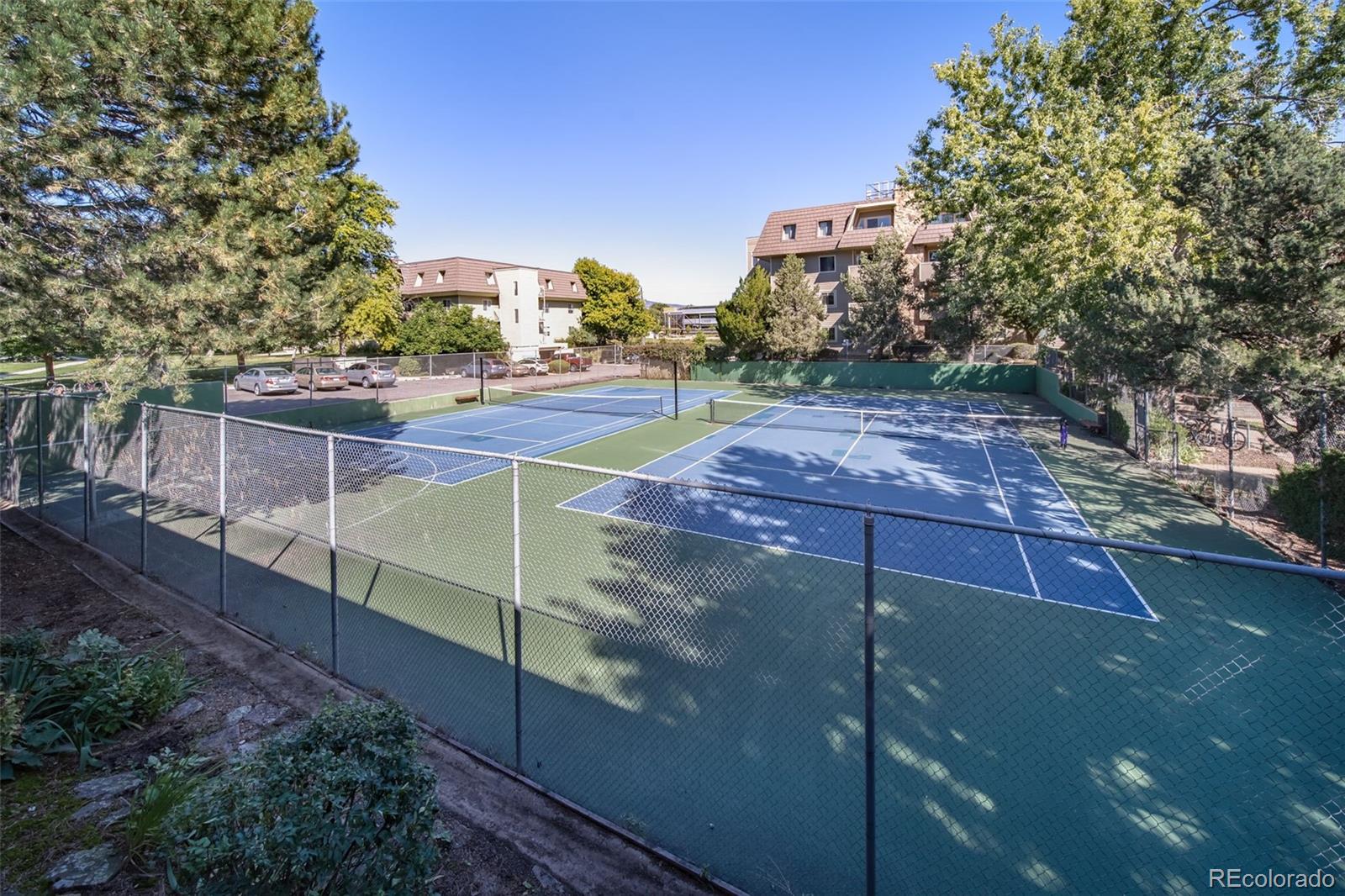 3375 Chisholm Trail, Unit A102 Boulder, CO 80301 - Photo 24 of 40 a view of a tennis court