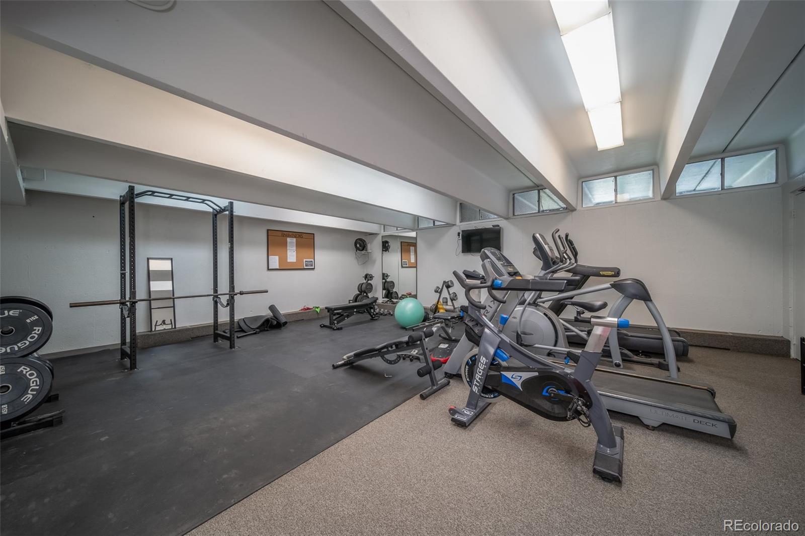 3375 Chisholm Trail, Unit A102 Boulder, CO 80301 - Photo 30 of 40 a view of a room with gym equipment