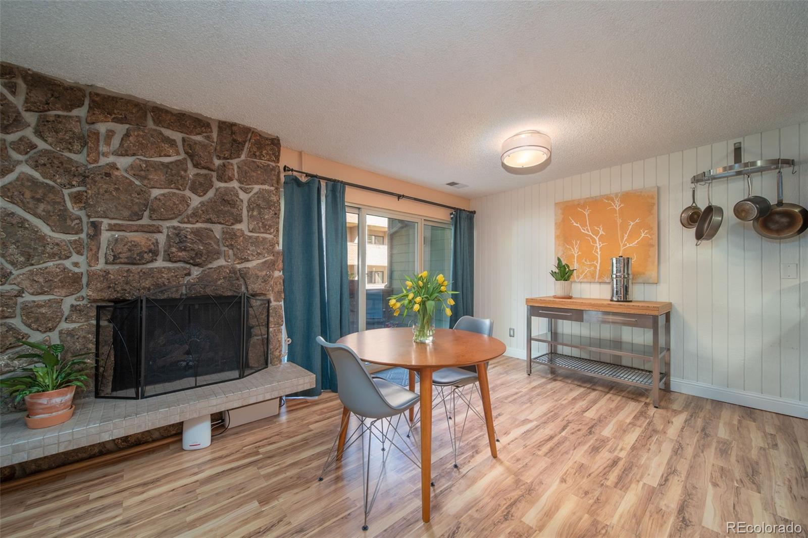 3375 Chisholm Trail, Unit A102 Boulder, CO 80301 - Photo 8 of 40 a dining room with furniture and window