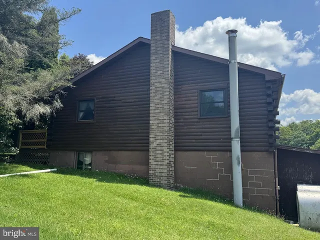 a backyard of a house with a garden