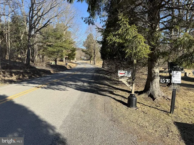 a view of street with sitting area
