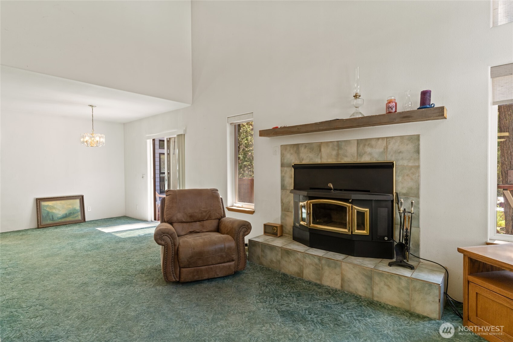 17976 Entiat River Road Entiat, WA 98822 - Photo 22 of 40 a living room with furniture and a fireplace