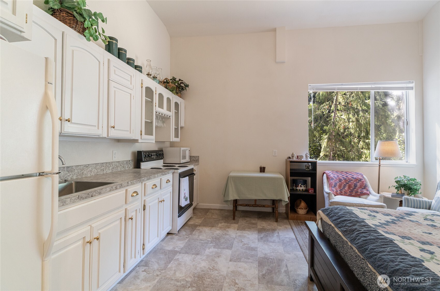 17976 Entiat River Road Entiat, WA 98822 - Photo 33 of 40 a kitchen with sink cabinets and stove top oven