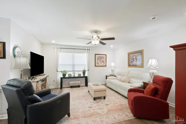 a view of a house with swimming pool and a yard