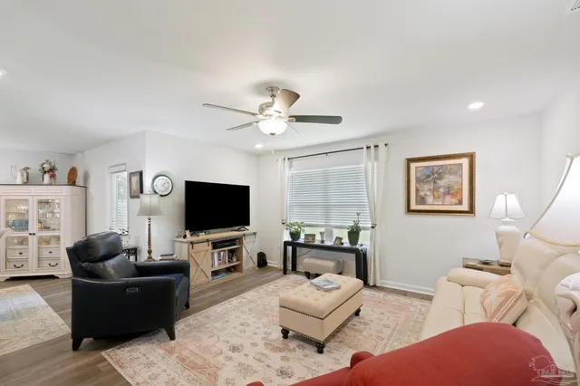 a view of a house with swimming pool and a yard