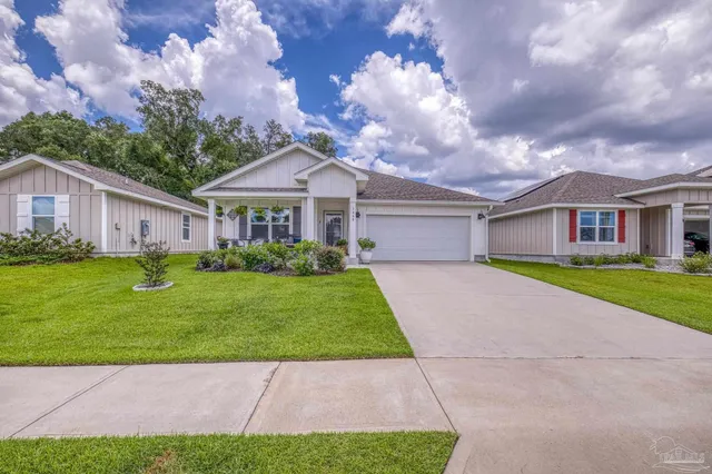 a view of a back yard from a room